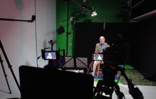 Professional Documentary Interview Video Production with black backdrop at Genie Lamp Studios Markham.